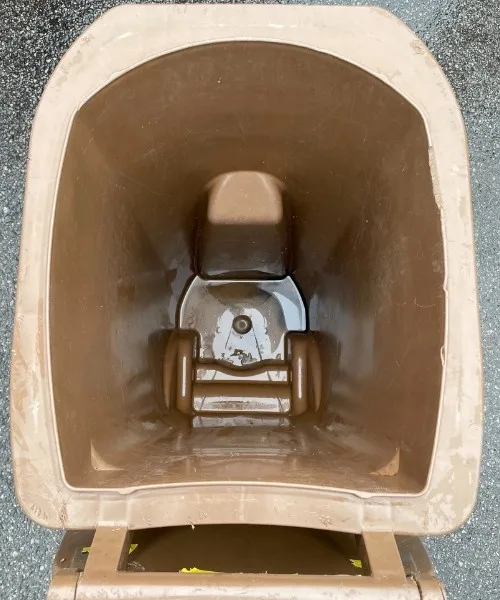 Fresh clean brown organic waste bin after professional cleaning