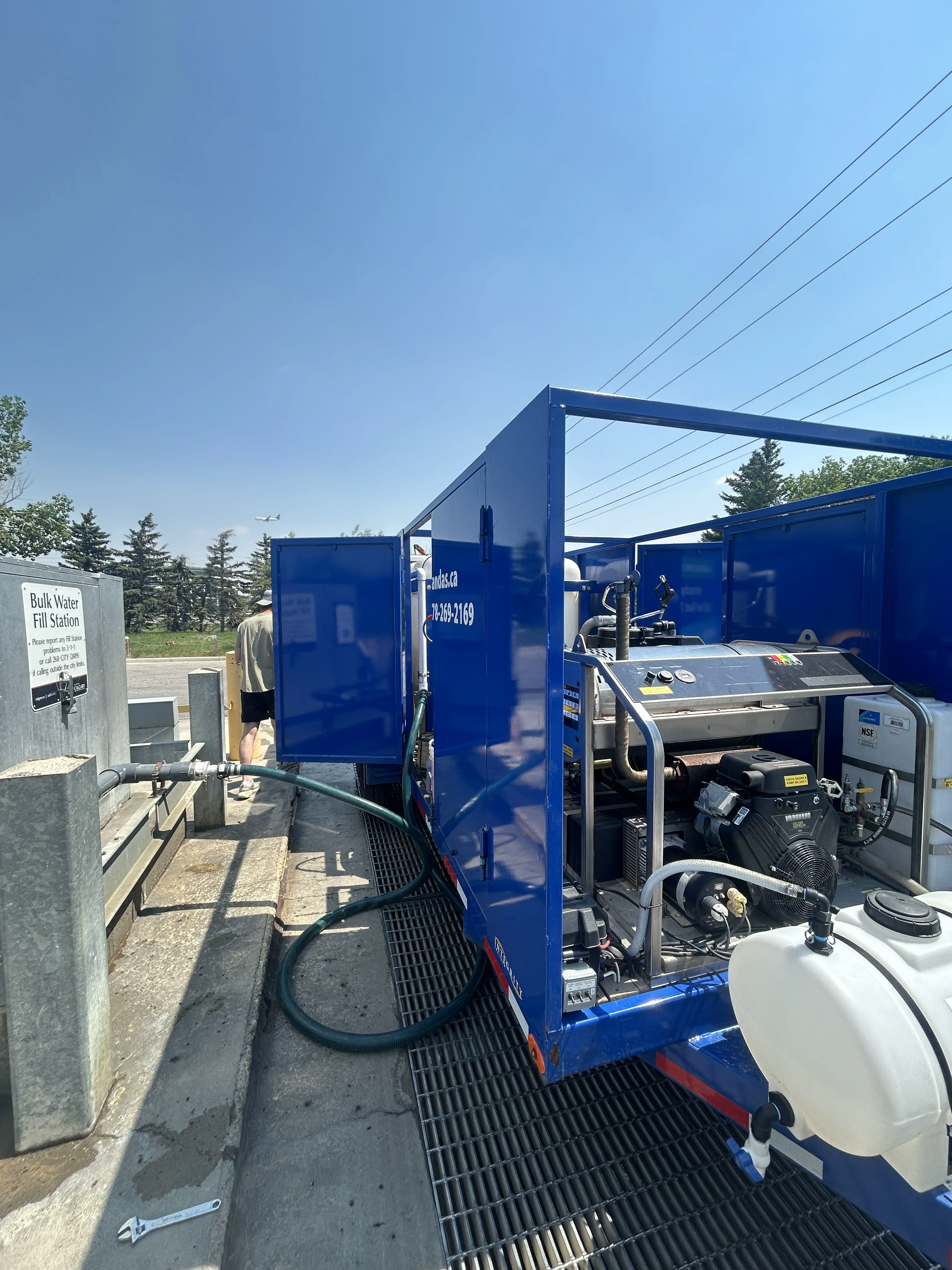 Cleaning equipment and hoses on truck